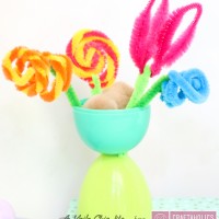 Kid Friendly Spring Flower Vase craft using plastic Easter eggs and pipe cleaners